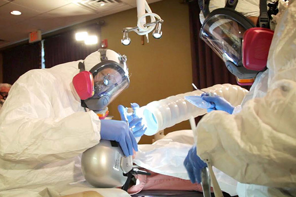 personal protective equipment required by OSHA for removing fillings.